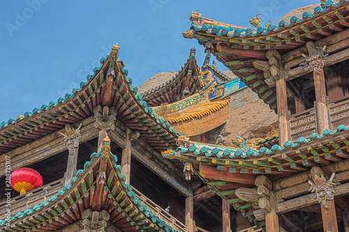 Roofs of protective wooden structures in front of the Yungang Grottoes near Datong