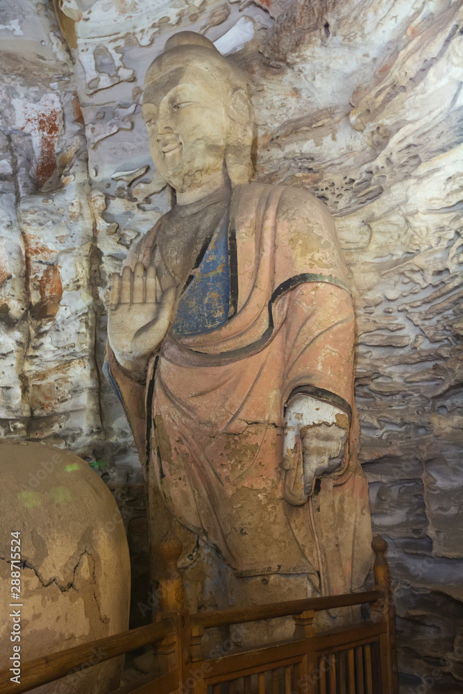 Buddha statue in cave 5 of the Yungang Grottoes near Datong
