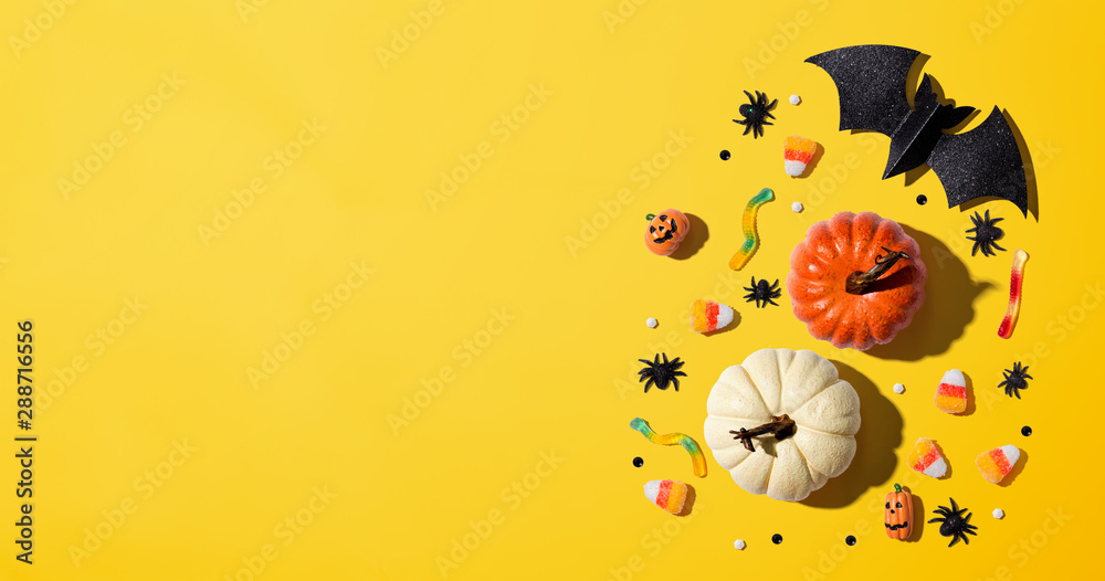 Pumpkins with Halloween decorations - overhead view flat lay - obrazy, fototapety, plakaty 