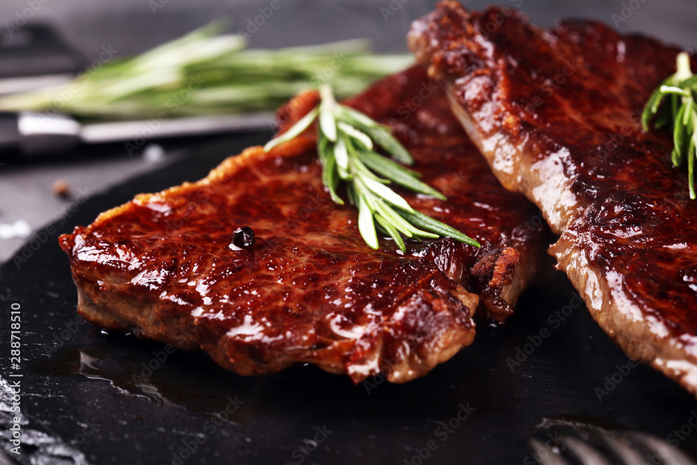 Barbecue Rib Eye Steak or rump steak - Dry Aged Wagyu Entrecote Steak on rustic background