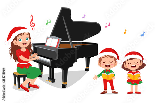 happy kids sing with piano christmas
