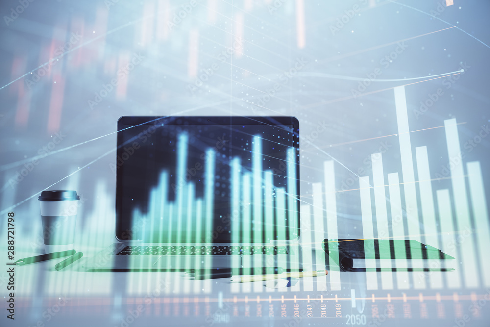 Forex graph hologram with desktop office computer background. Double exposure. Concept of financial analysis. Forex graph hologram with desktop office computer background. Double exposure. Concept of financial analysis.