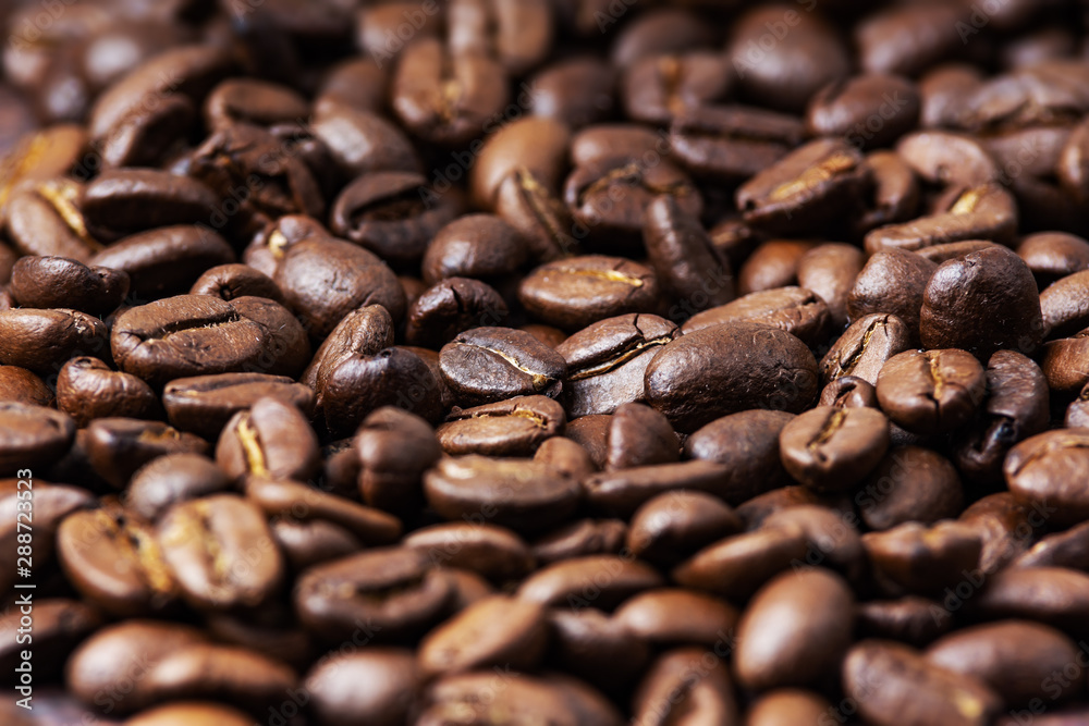 coffee beans on burlap background coffee beans on burlap background