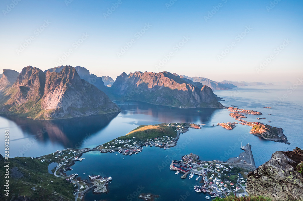Beautiful scenery of Reine on top of Reinebringen during sunset time on a clear summer day, Lofoten Islands, North Norway