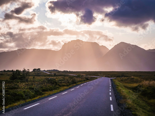 Obraz na płótnie Dramatic landscape on E10 highway in Lofoten during sunset, North Norway w salonie