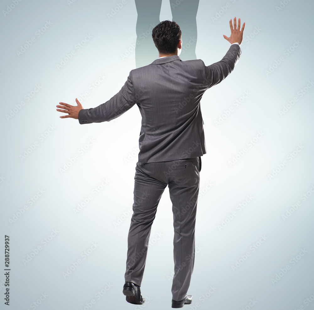 Businessman with aspiration of becoming superhero Businessman with aspiration of becoming superhero