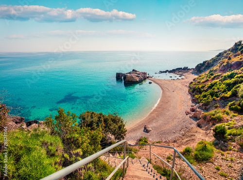 Splendid spring scene of Little Xigia beach. Sunny morning seascape of Ionian Sea, Zakynthos island, Greece, Europe. Beauty of nature concept background. photo