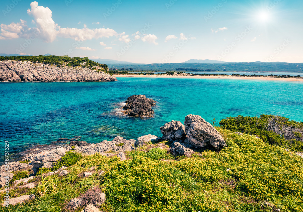 Picturesque spring view of Voidokilia beach. Bright morning seascape of Ionian Sea, Pilos town location, Greece, Europe. Beauty of nature concept background. Instagram filter toned.
