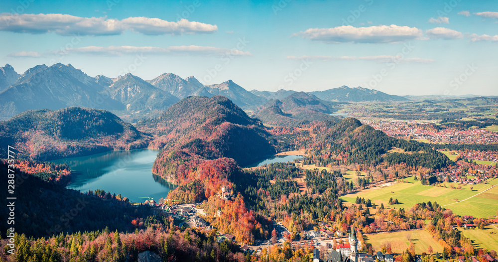 Aerial autumn panorama of Alterschrofen village in Fussen Germany. Sunny morning panorama of Bavarian Alps, Germany, Europe. Traveling concept background. - obrazy, fototapety, plakaty 