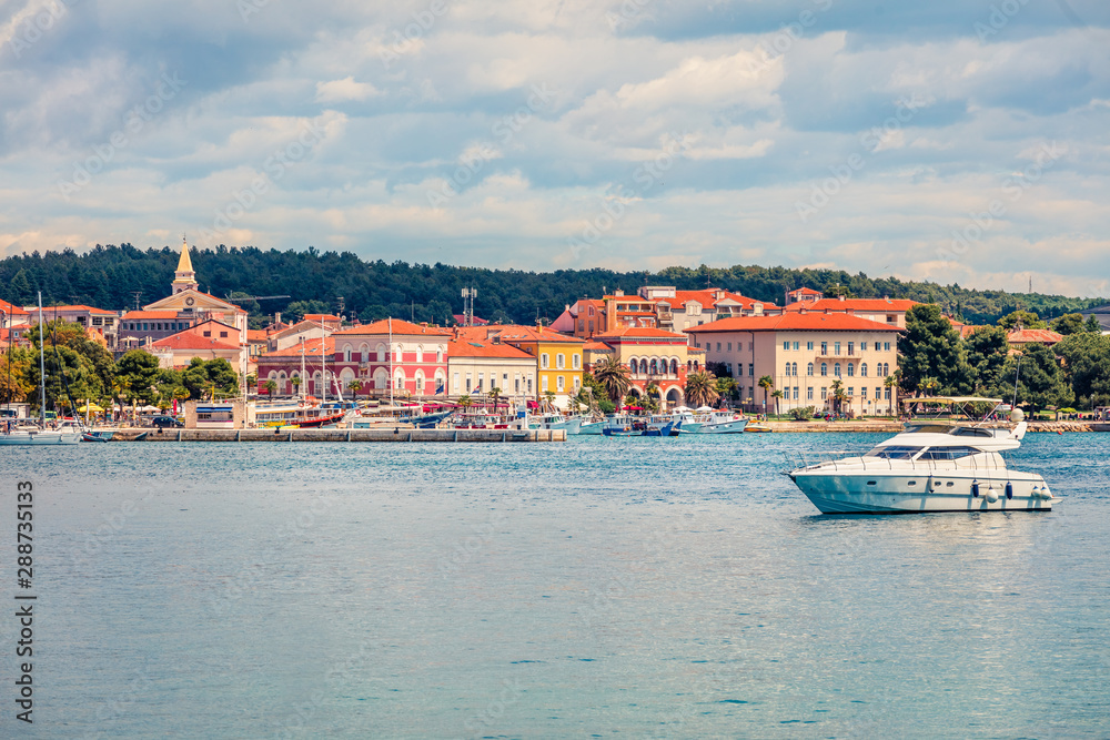 Bright morning cityscape of popular summer resort Porec. Beautiful spring seascape of Adriatic Sea. Stunning scene of Istrian Peninsula in western Croatia, Europe. Instagram filter toned.