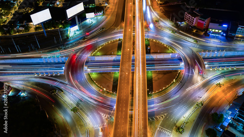 Photography Aerial view Expressway motorway highway circus intersection at Night time Top view , Road traffic in city at thailand