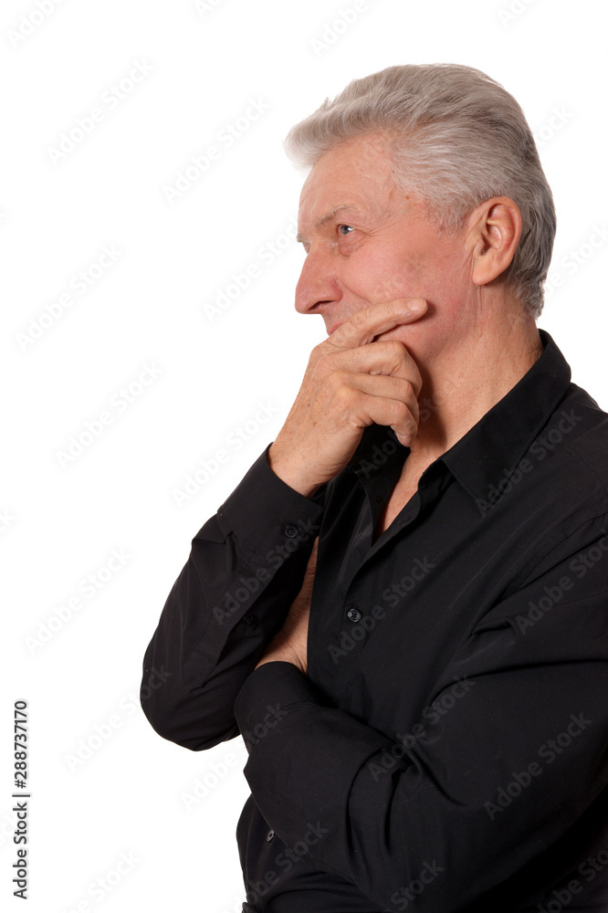 Portrait of thinking senior man on white background