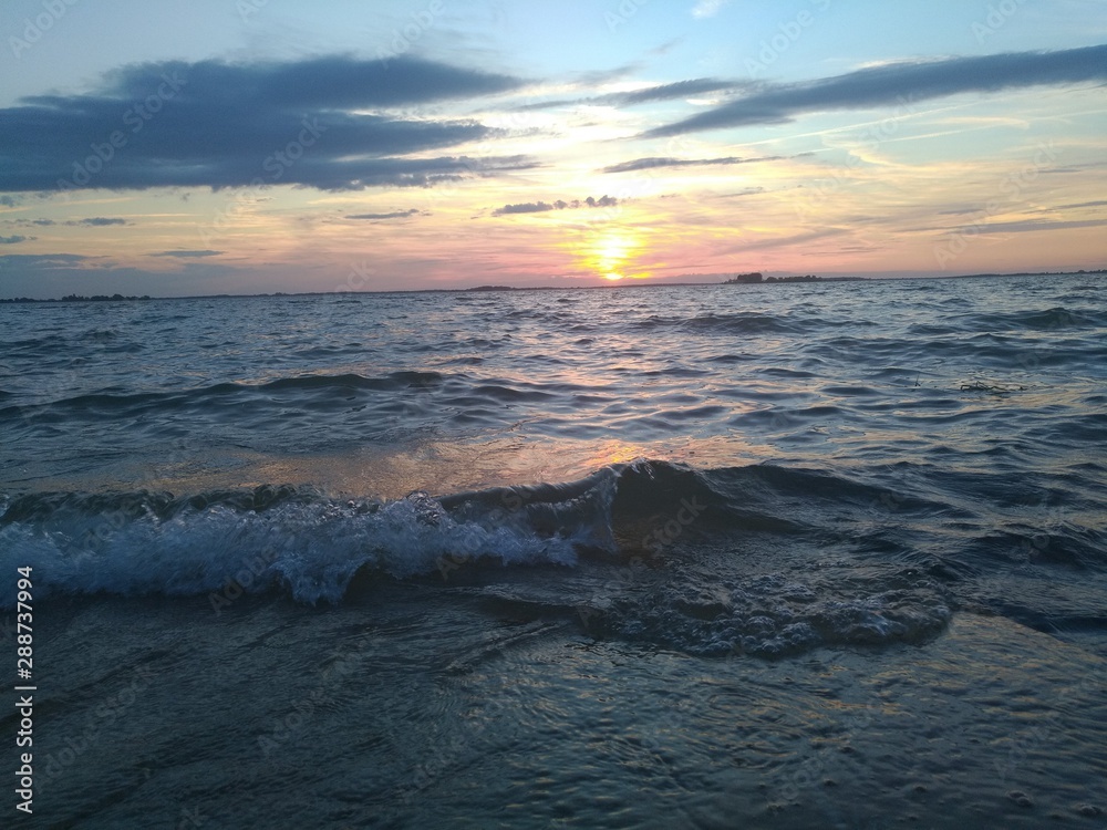 Naklejka premium sunset over the sea