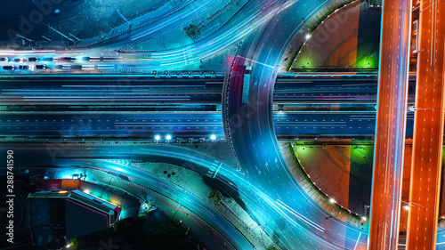 Aerial view Expressway motorway highway circus intersection at Night time Top view , Road traffic in city at thailand.