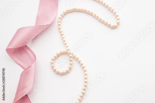 Feminine desktop mockup with pearls and pink ribbon