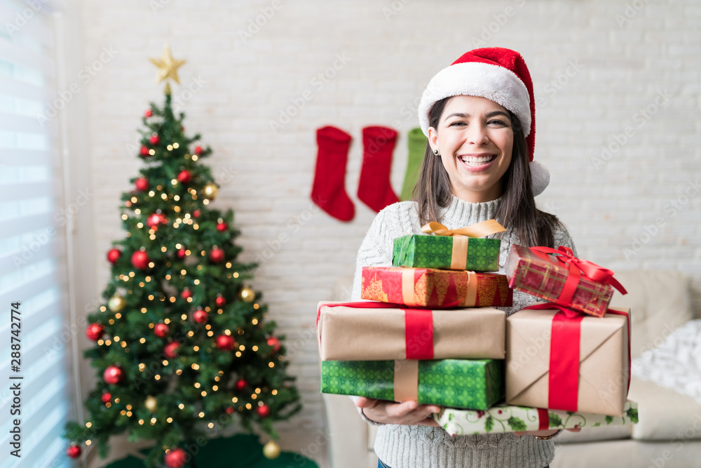 Happy Woman With Heap Of Christmas Presents Happy Woman With Heap Of Christmas Presents