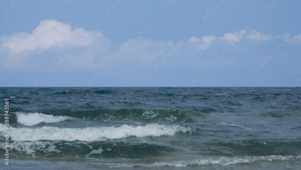 Sea waves breaking on shore, observer point of view. Slow pan. Sea waves breaking on shore, observer point of view. Slow pan.