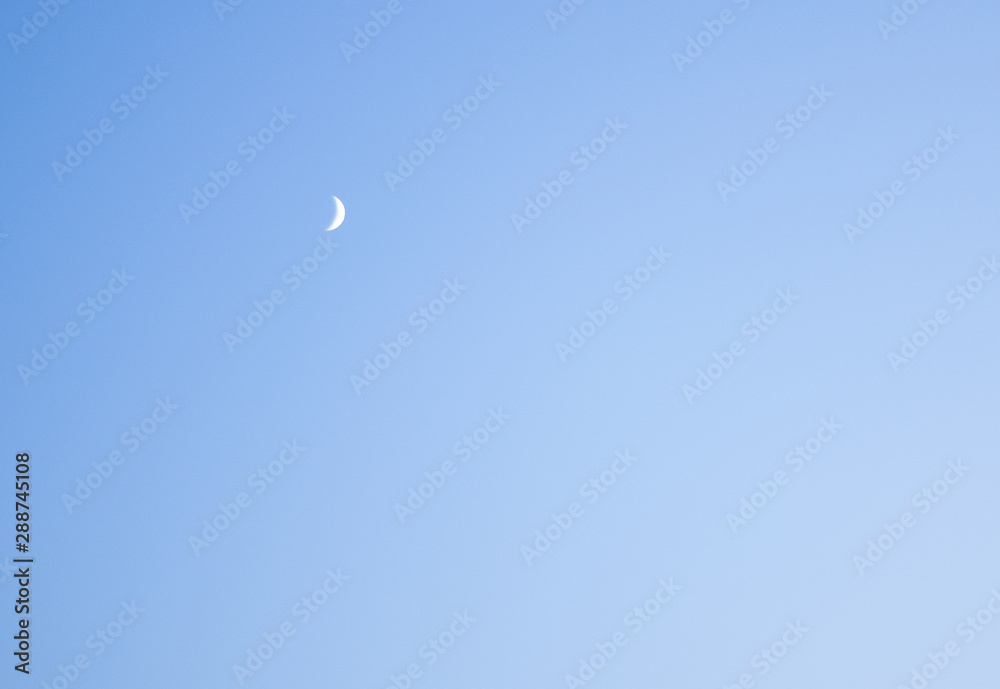 Crescent moon with beautiful sunset background Crescent moon with beautiful sunset background