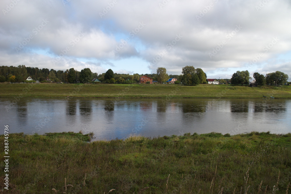 riverbank in the countryside on a summer day riverbank in the countryside on a summer day