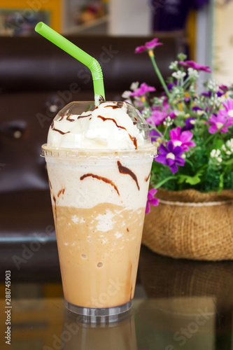 Ice mocha frappe with whip cream. photo