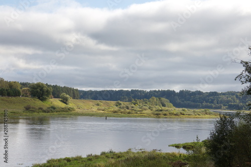 riverbank in the countryside on a summer day