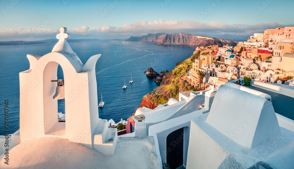 Fototapeta premium Exciting morning scene of Santorini island. Picturesque spring cityscape of famous Greek resort Fira, Greece, Europe. Traveling concept background. Orton Effect.