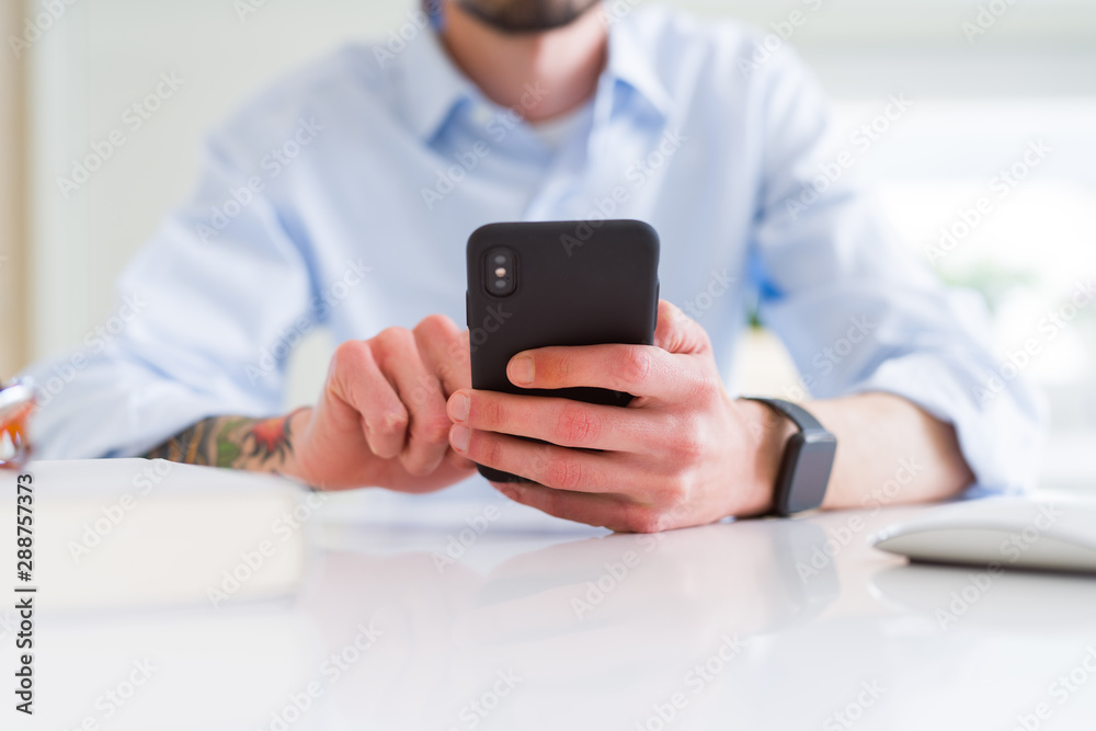 Close up of business man working using smartphone Close up of business man working using smartphone