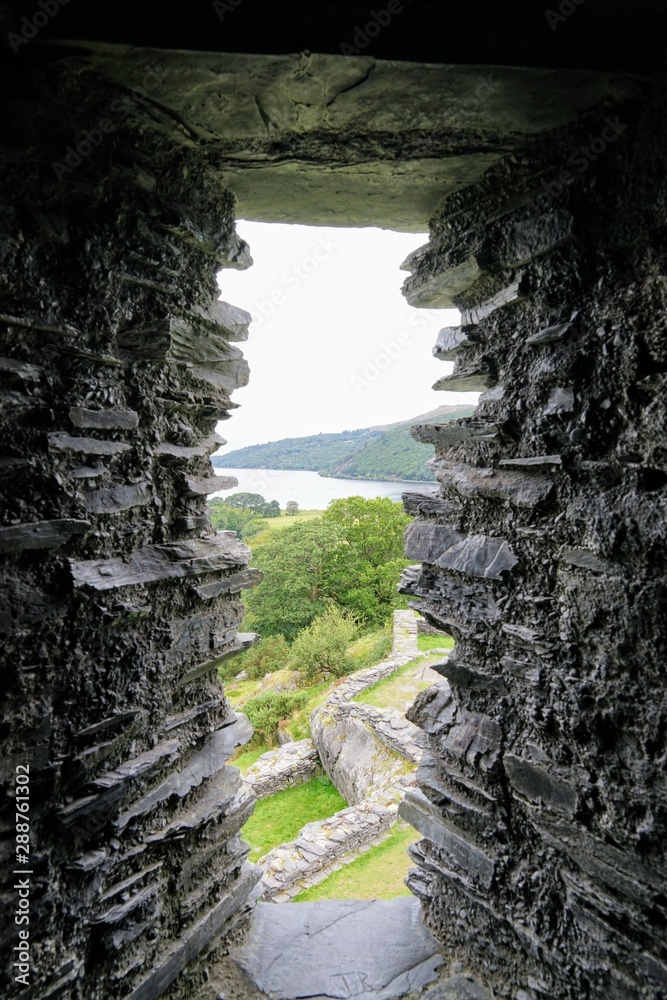 Window in a Ancient Castle with Rocks and Stones Window in a Ancient Castle with Rocks and Stones