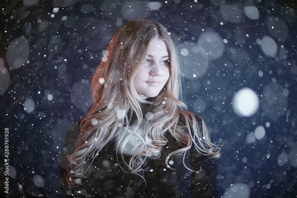 winter blonde / young adult model, blonde with long beautiful hair posing in the winter season
