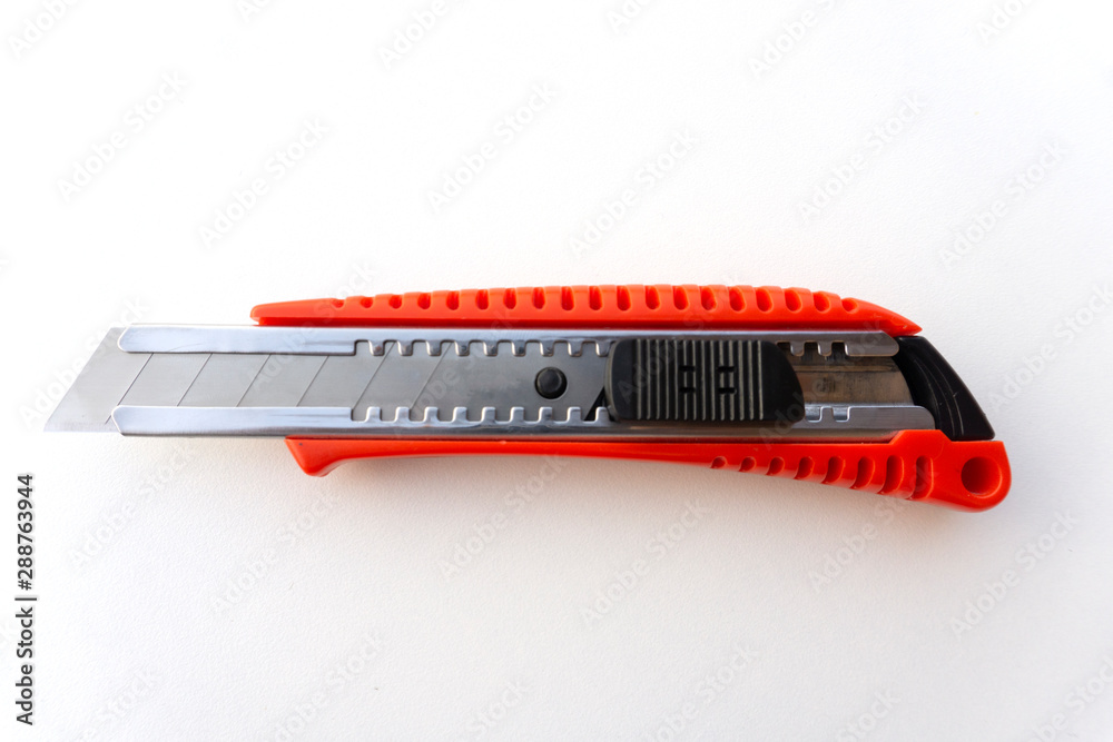 A red cutter isolated on white background. A red cutter isolated on white background.