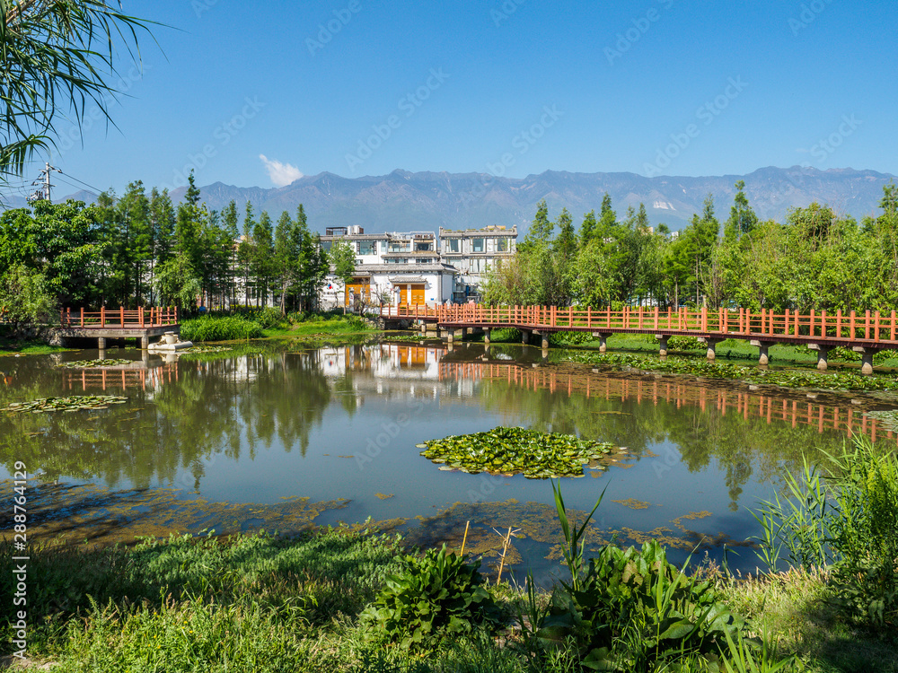 Shore of a small Lake at a park in the city of Dali (Yunnan province - China).