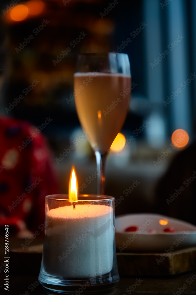 Romantic dinner. Lit a candle and a glass of champagne. Romantic dinner. Lit a candle and a glass of champagne.