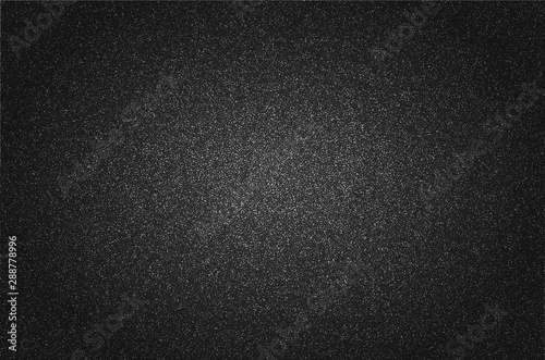 Rich black grained background with round gradient. Dotted textured vector backdrop for web and print design.