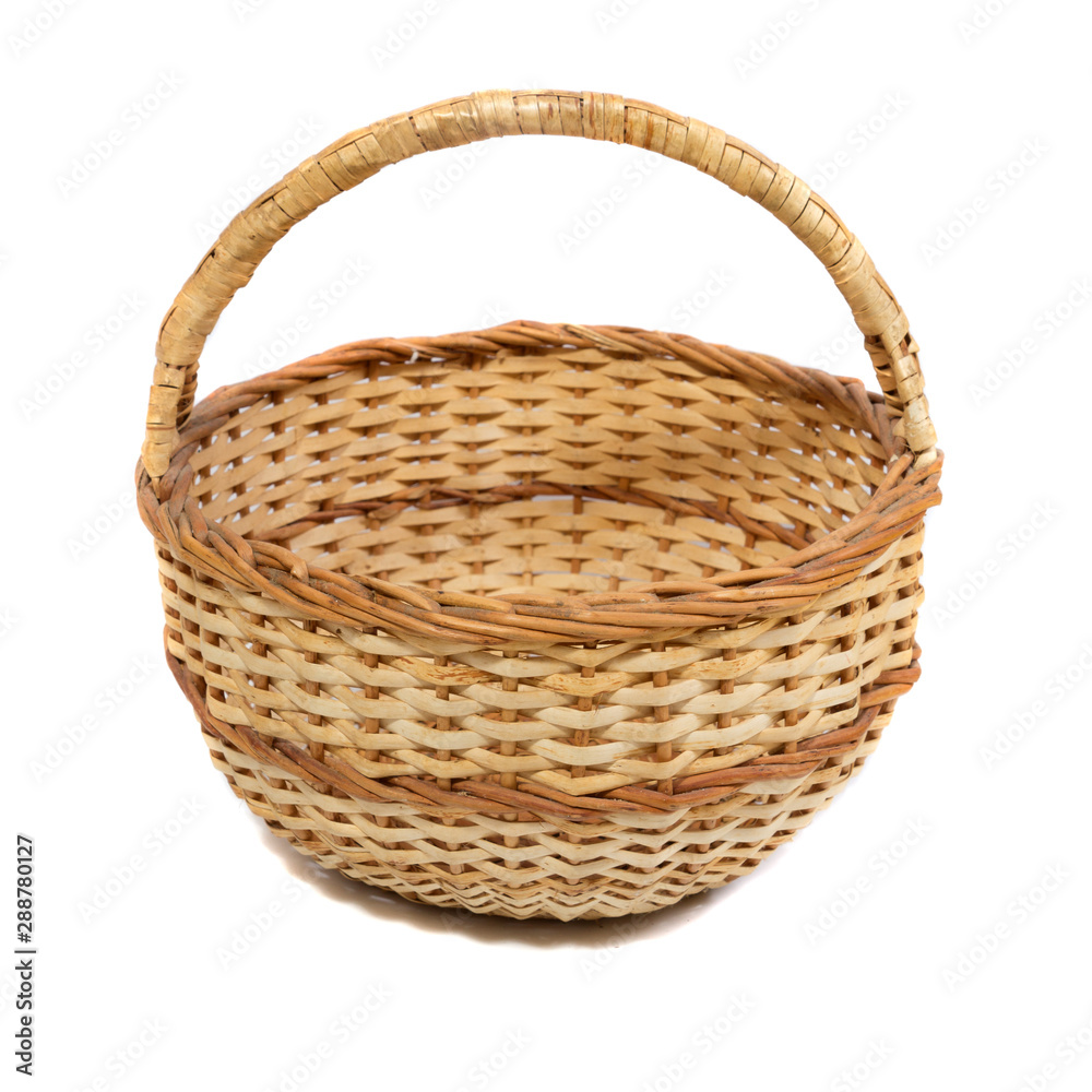 Fototapeta premium Empty wooden wicker basket isolated on white background.