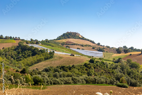 Solarcells on the hills of the village of Montedinove in Italy. photo