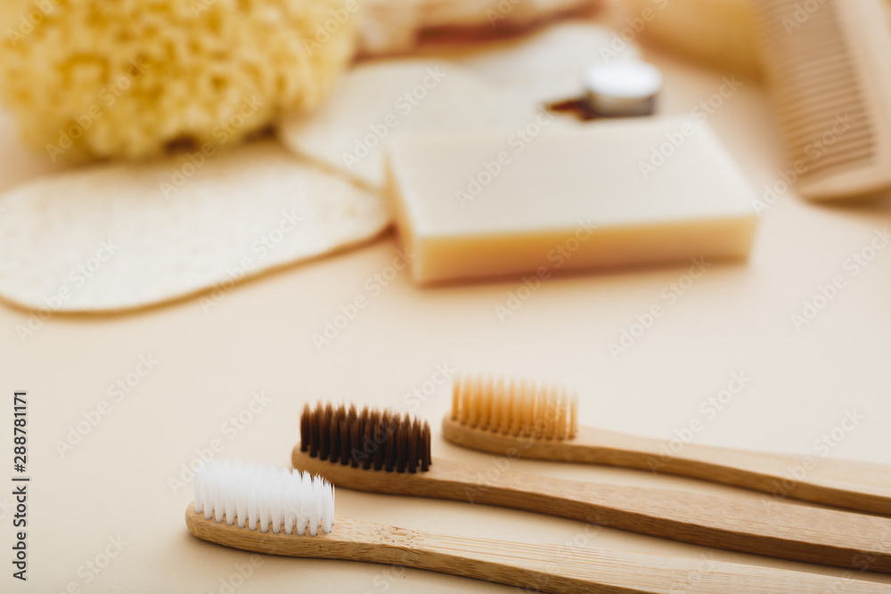 Zero waste and plastic free concept with bamboo tooth brush, towel, sea sponge, loofah, soap, wooden hair brush. Eco-friendly bathroom. Natural products. Zero waste and plastic free concept with bamboo tooth brush, towel, sea sponge, loofah, soap, wooden hair brush. Eco-friendly bathroom. Natural products.