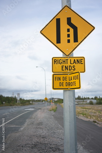Yellowknife,Canada-September 1, 2019: Right Lane Ends sign along 48th street in Yellowknife, Canada