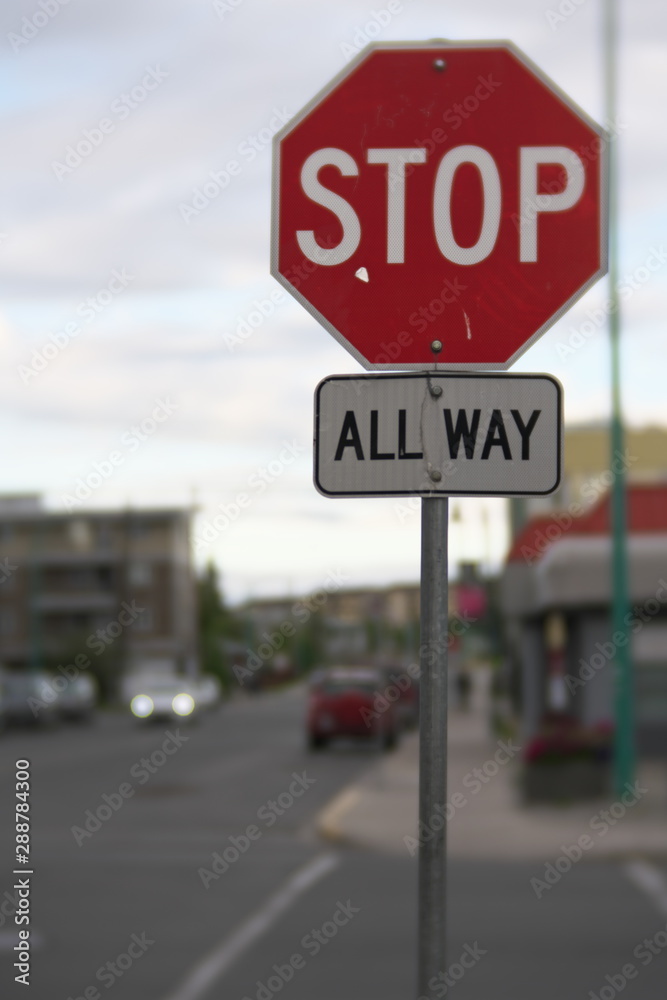 Yellowknife,Canada-August 29, 2019: (Deep Bokeh) Stop All Way traffic sign in Yellowknife, Canada Yellowknife,Canada-August 29, 2019: (Deep Bokeh) Stop All Way traffic sign in Yellowknife, Canada