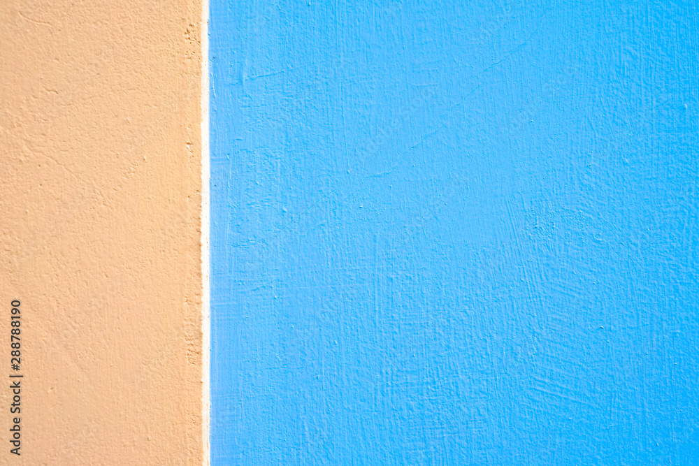 Fototapeta premium Bright pink coral and light blue color bands, wall graphic background element.