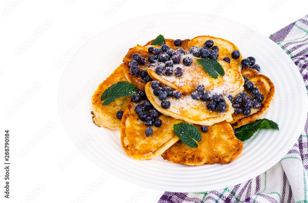 Tasty sweet pancakes with sugar and blueberries