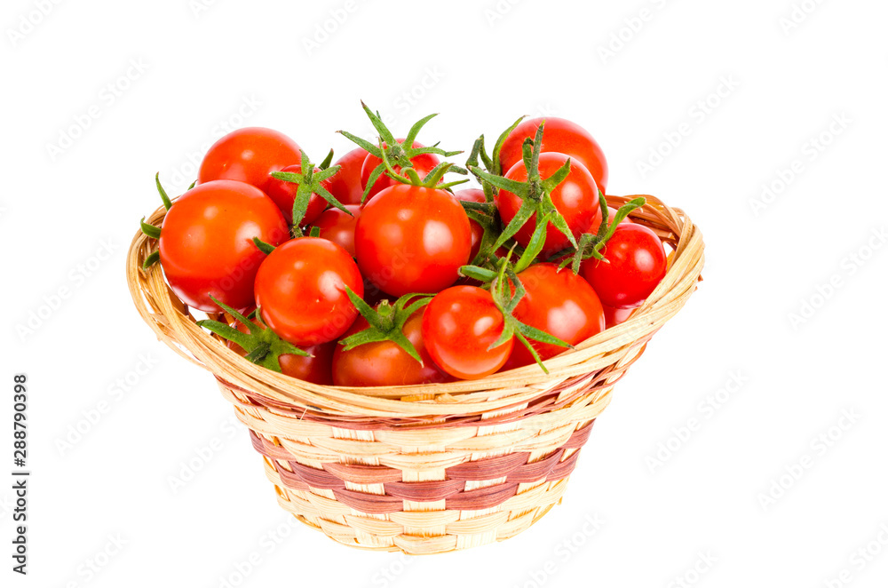Wicker bowl with red tomatoes. Studio Photo Wicker bowl with red tomatoes. Studio Photo