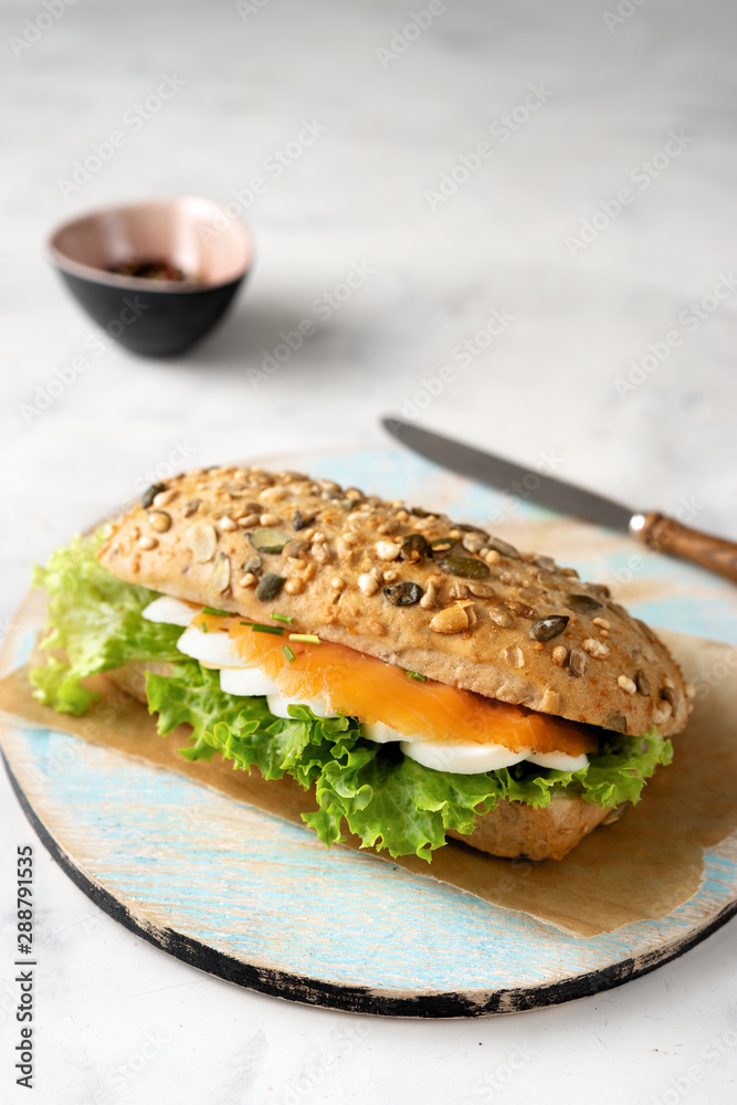 Healthy sandwich with salmon on white background Healthy sandwich with salmon on white background