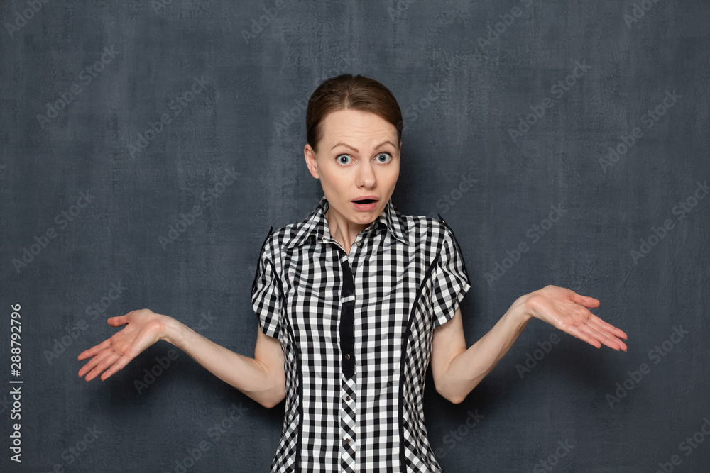 Portrait of surprised girl looking with misunderstanding Portrait of surprised girl looking with misunderstanding
