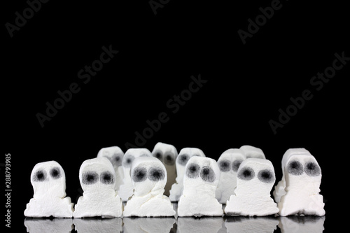 Fotografía Halloween ghost sweets in a group