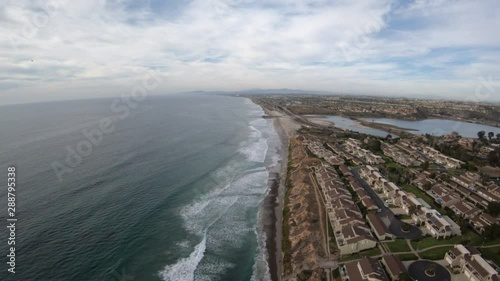 Grandview Surf Beach Flying Towards Batiquitos Lagoon State Marine Conservation Area and South Ponto Beach Encinitas California USA Aerial View photo