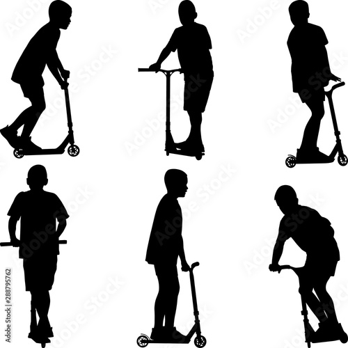 boy with scooter silhouettes