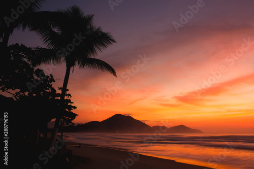 Sunrise in a beach of Ubatuba, Sao Paulo, Brazil photo