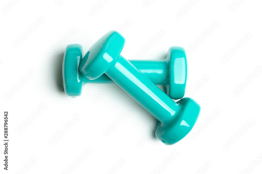 Two dumbbells isolated on white background. Concept Gym Lifestyle Two dumbbells isolated on white background. Concept Gym Lifestyle