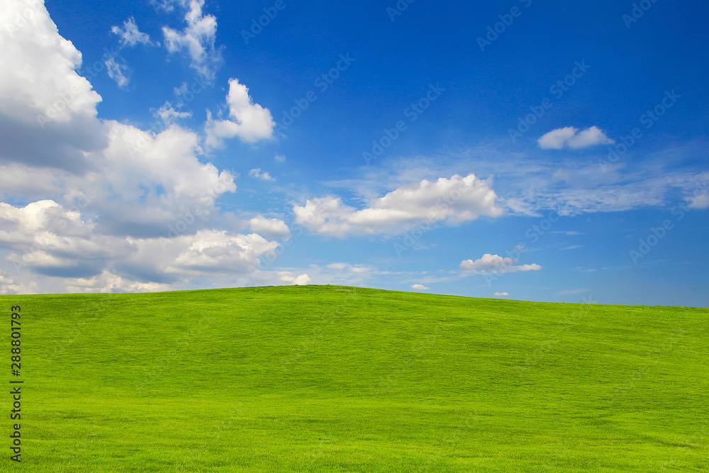 green hill on blue sky background