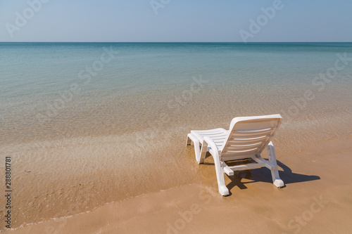 Beach chair at sunny coast at the beach